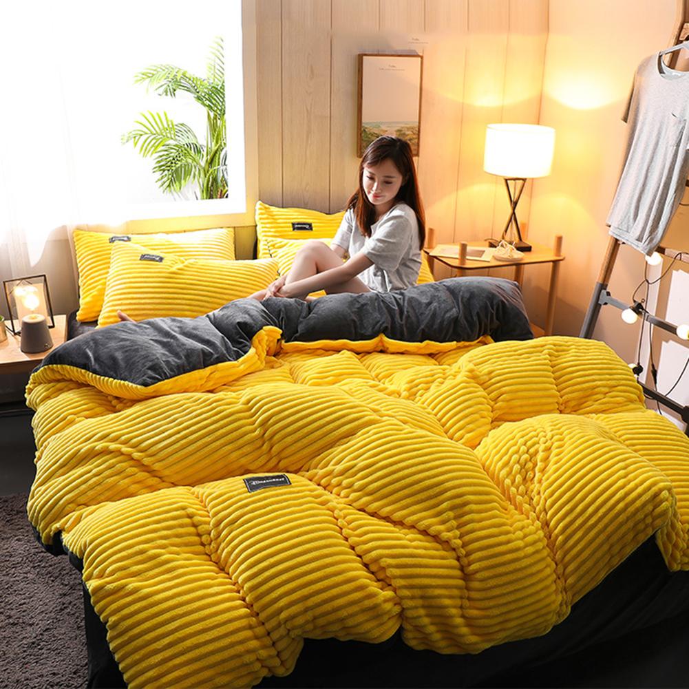 Sitting girl on Yellow Cozy Bedding set 